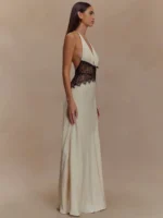 Elegant white dress with black lace waist detail, perfect for formal occasions and stylish events.