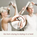 Woman using a hair dryer and styling tools for quick hair drying and styling.