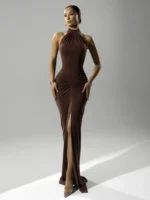 Elegant brown evening gown with high slit and halter neckline, perfect for formal events and special.
