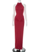 Red sleeveless maxi dress with ruched details and high neckline, perfect for formal occasions.