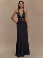 Elegant black evening gown with lace accents and deep V neckline for formal occasions.