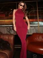 Model in a stylish red dress at Thrive Store.