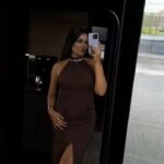 Elegant brown dress with slit, perfect for stylish occasions at Thrive Store.