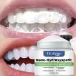 Oral hygiene with Nano-Hydroxyapatite dental powder for healthy teeth.